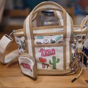 Aero Women's Cream and Tan Tote Bag